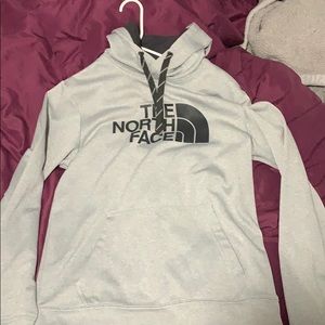 Gray and black north face sweatshirt